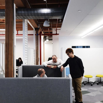 Loblaw Digital - Tech + dev team members taking full advantage of the collaborative space in our new office