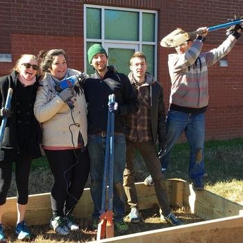Longstreet Solutions, Inc. - Some of us spent MLK Day building gardens & making silly faces.
