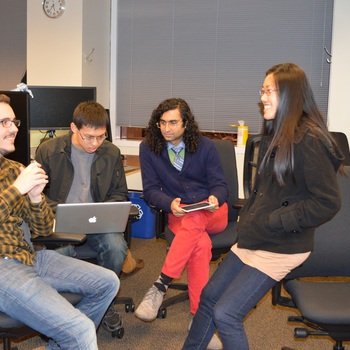 Marin Software Incorporated - Cross-departmental team discussing their hackday project.