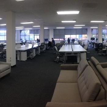 Manage.com - Our spacious office space (adjustable standing desks for everyone!)