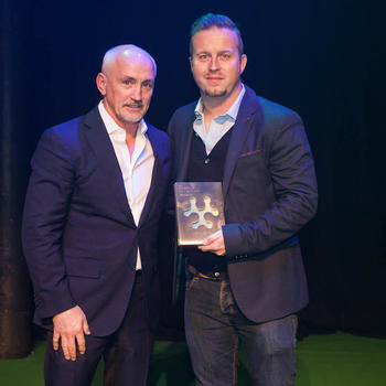 Football Whispers - Our CEO Vivion Cox receiving the Sports Technology Award for "Outstanding Startup" from boxing legend Barry McGuigan.