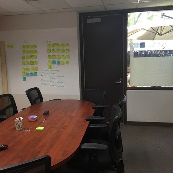 Evergive - The conference room is used for meetings and planning sessions.