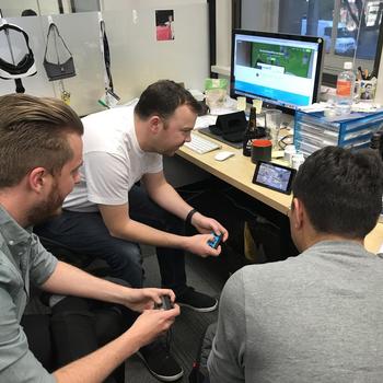 StreamShark - Some of the team playing Mario Kart on the smallest screen possible.