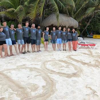 Dock - Team retreat in Mexico. Team challenges on the beach!