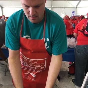 Dante Consulting, Inc. - Volunteering for the AARP Meal Pack Challenge in Washington, D.C.