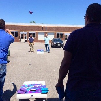 Racktop Systems Inc. - Training for the corn hole tournament.