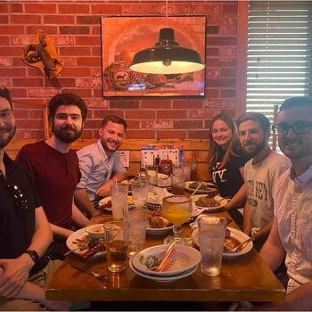 Zeal IT Consultants - Zealers sharing a meal after work together. 