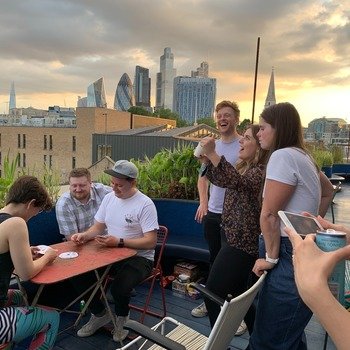 Progression - Board games on the roof terrace during a company get together