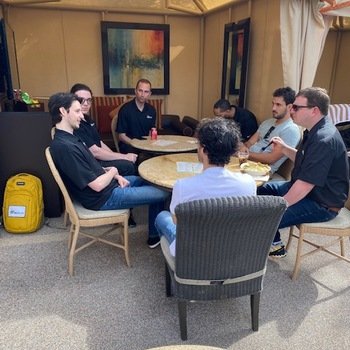 BizzyCar, Inc - The BizzyCar team collaborating poolside in Las Vegas. 