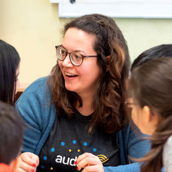 Audible - Woman smiling while talking with children