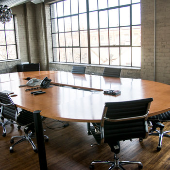 Needls Media Inc. - Team meetings and lunches happen here in out beautiful brick and beam office board room.