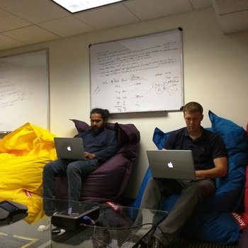 CPO Commerce - Dev team in tech meeting room.